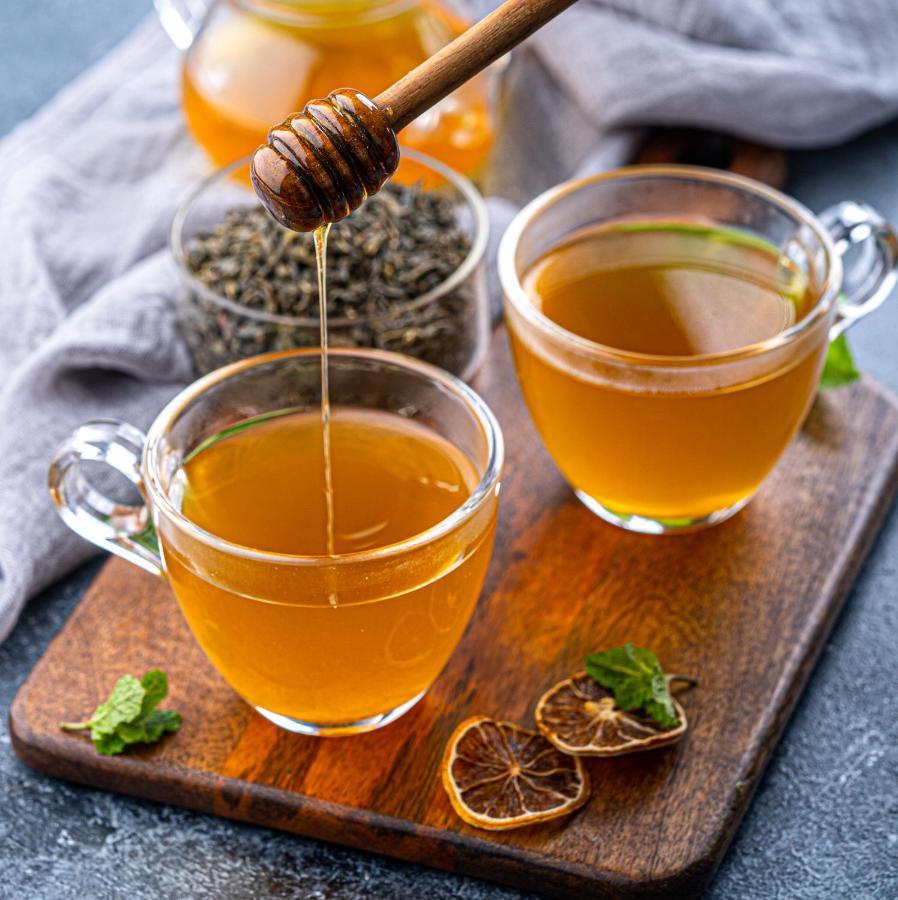 Hyatt Regency Thessaloniki Hotel Eksteriør billede Honey being drizzled into a cup of tea